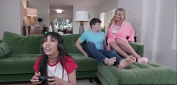  Rachael Cavalli noticed that her stepson is horny but her gamer gf is busy playing video games so they decided to started a quick sex behind her.